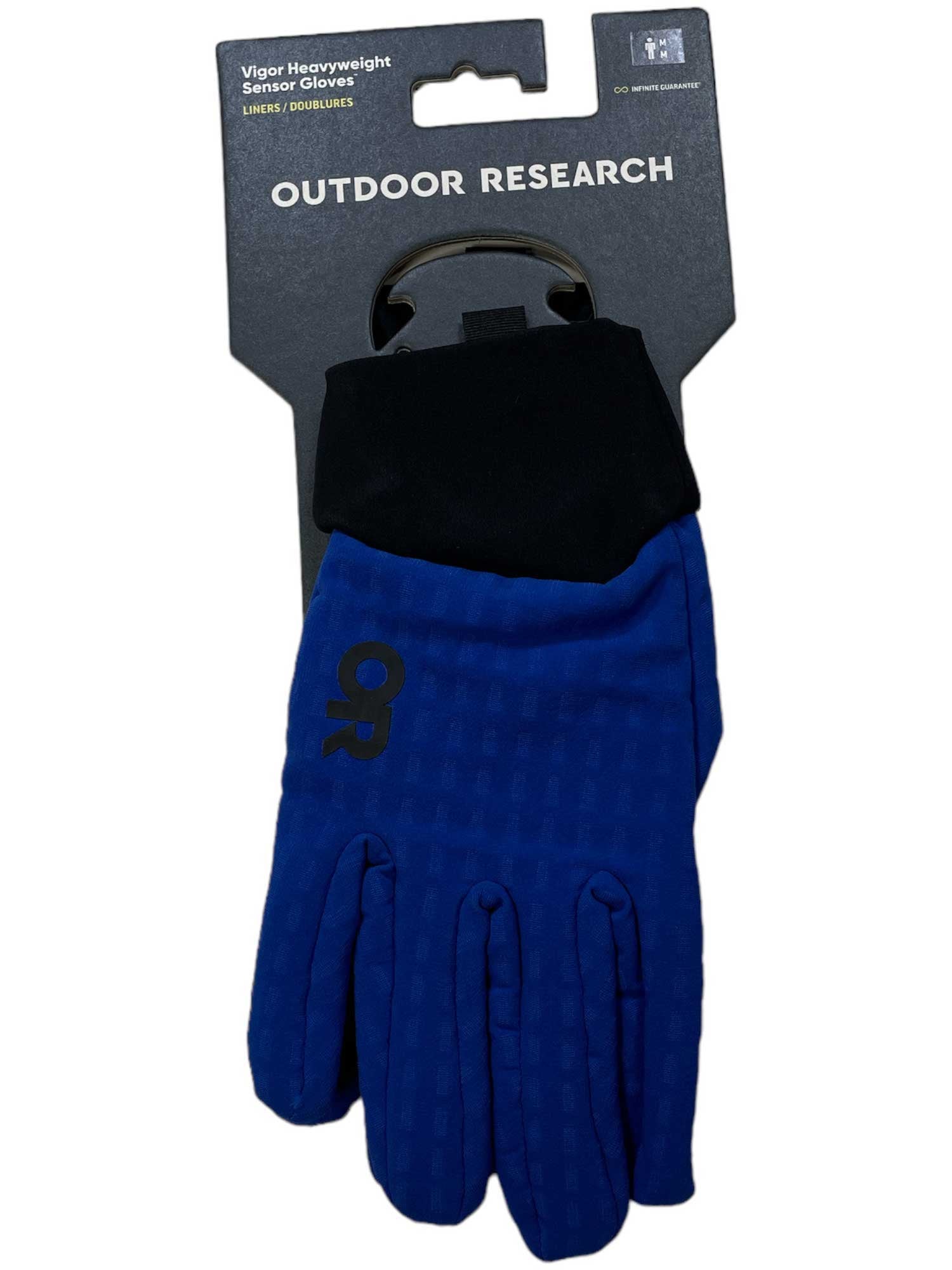 The Outdoor Research Mens Vigor Heavyweight Sensor Glove in blue and black features touchscreen-compatible fingertips, OR logo, and packaging with product info. ActiveTemp tech keeps hands comfortable in all conditions.
