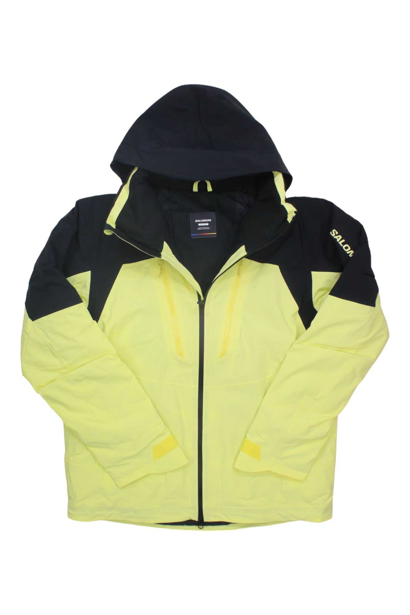 The Salomon Men's Brilliant Jacket is a yellow and black waterproof hooded ski jacket with PrimaLoft Eco insulation, front zipper, two chest pockets, and "SAILOR" on the left sleeve. The hood and shoulders are black; the body is yellow.