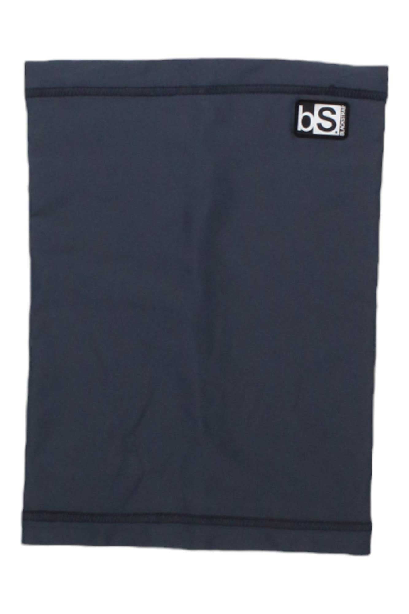 The BlackStrap The Tube is a dark gray rectangular neck gaiter featuring a small black and white bS logo tag near the top, ideal multifunctional headwear for outdoor protection.