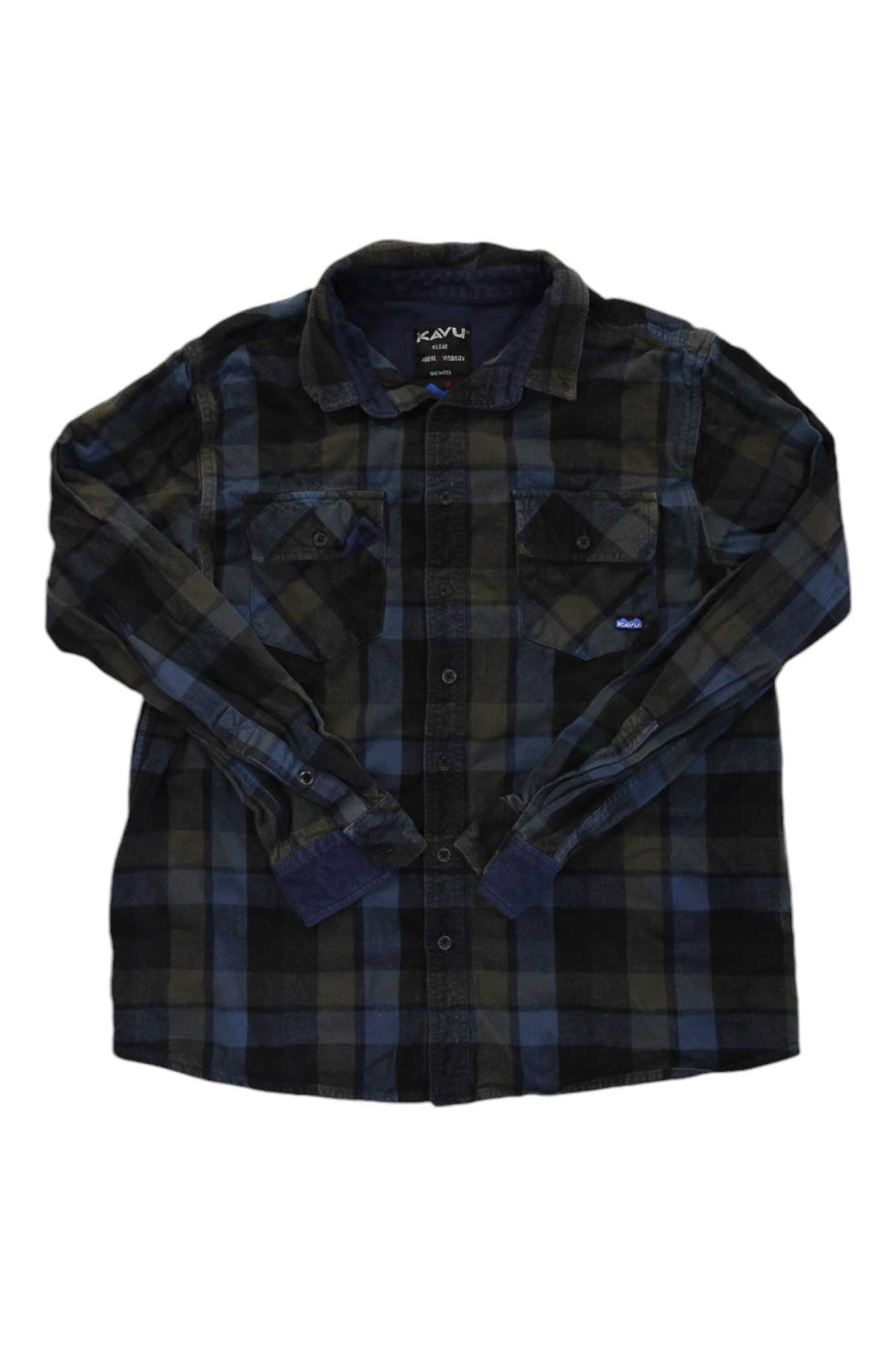 The KAVU Mens Buffaroni Shirt is a long-sleeve button-up with a blue, green, and black plaid pattern, two chest pockets, and a collar, shown laid flat on a white background.