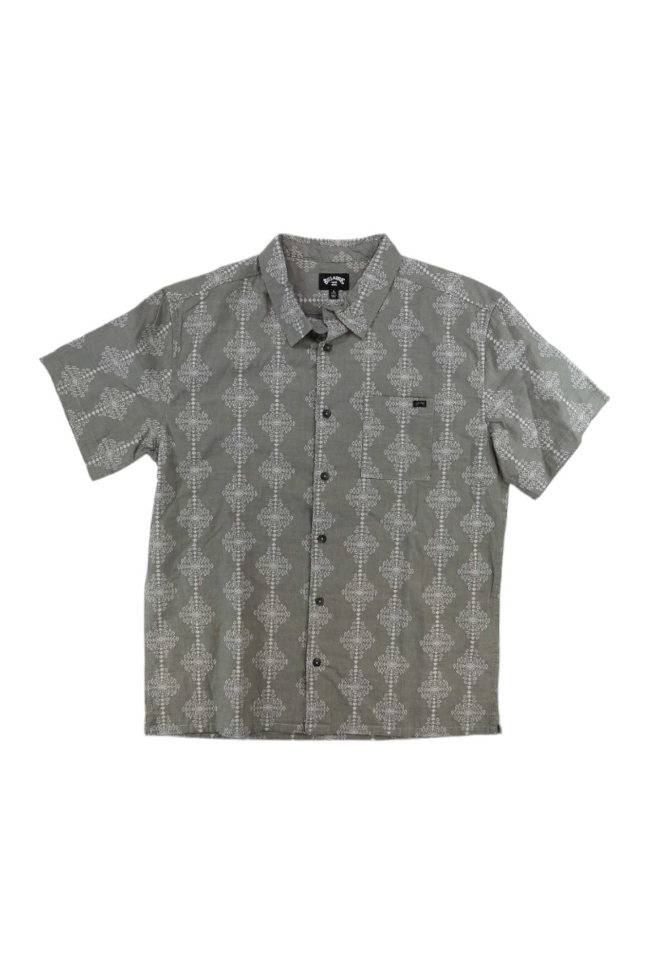 The Billabong Mens Sundays Jacquard SS Shirt is a gray short sleeve shirt featuring a white geometric pattern, collar, moisture-wicking fabric, and a small black logo tag on the left chest. Shirt is displayed flat on a white background.