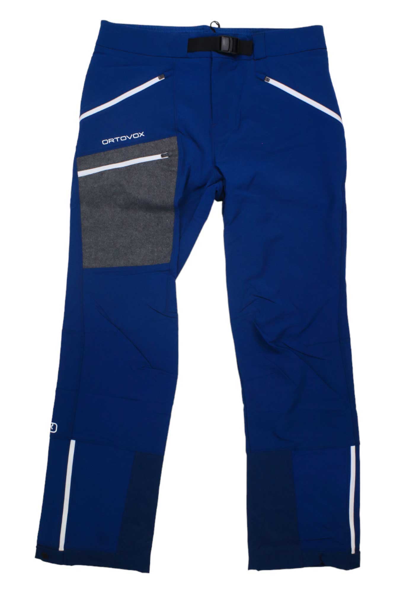 A pair of Ortovox Men's Cevedale Pants in blue, designed for all-mountain skiing, with white zipper accents, a gray right thigh pocket, and a built-in belt. The pants are laid flat on a white background.