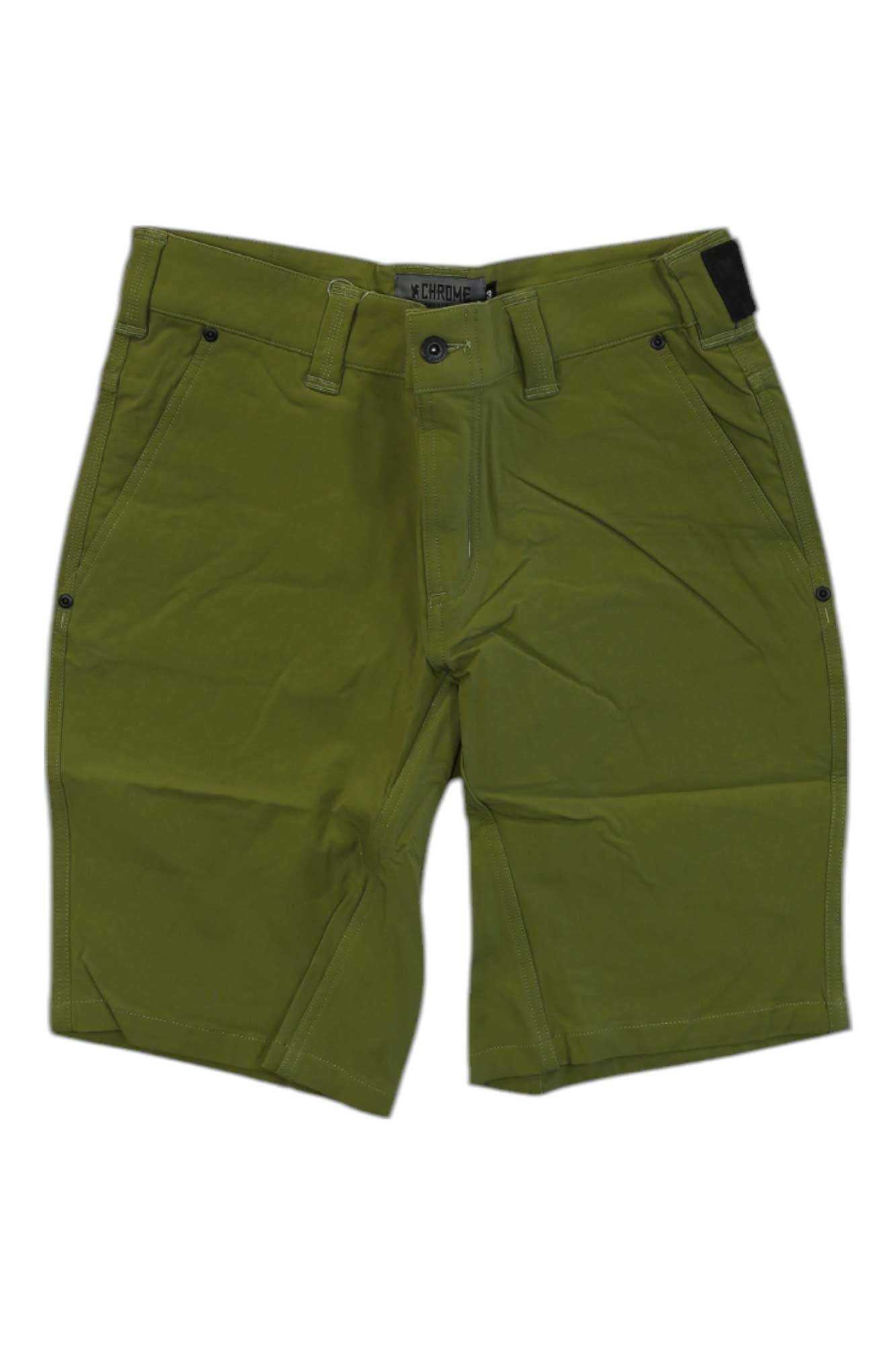 The Chrome Industries Mens Folsom Short 2.0, in olive green, knee-length style, features belt loops, a front button closure, side pockets, and a discreet u-lock holster, shown laid flat on a white background.