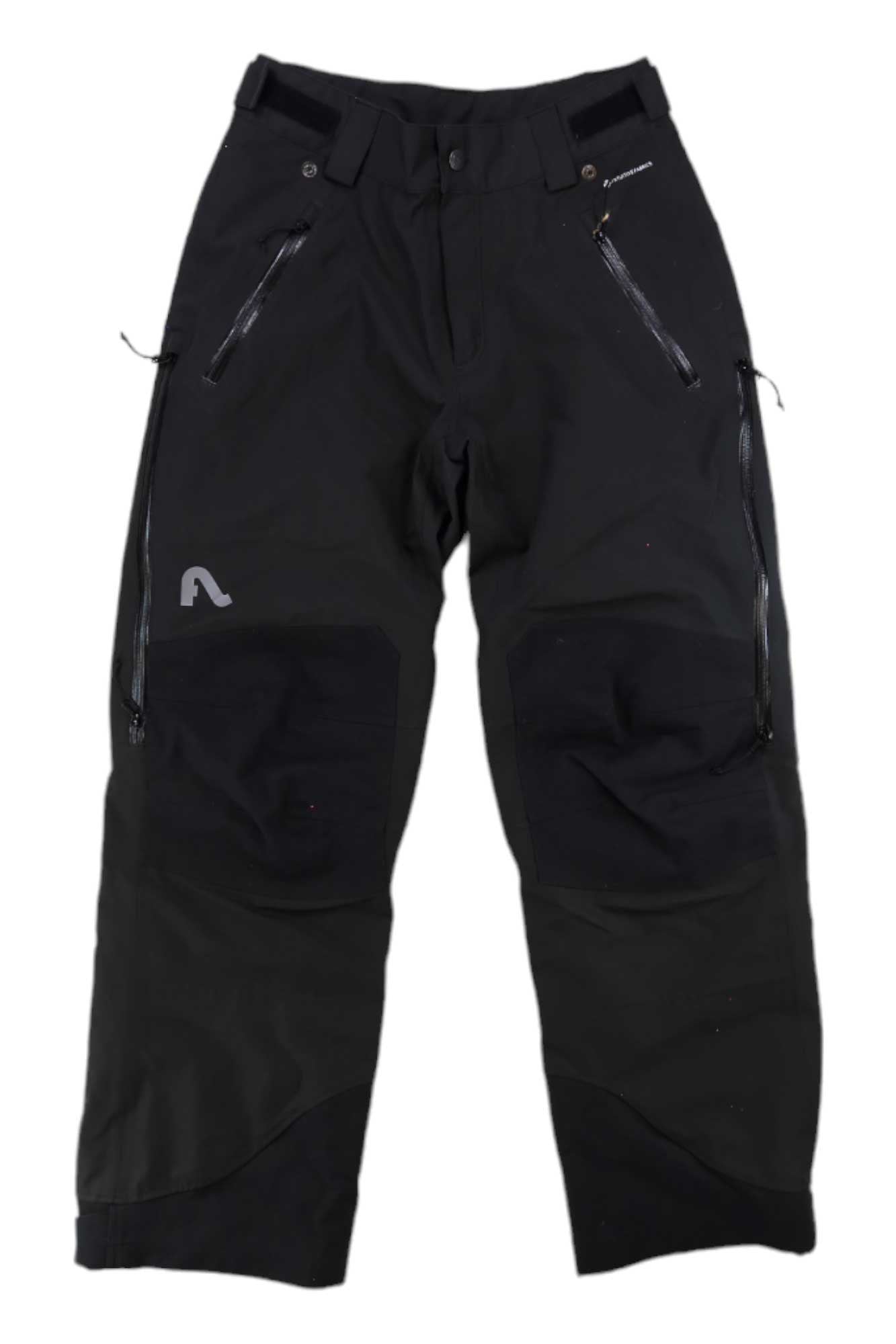 The Flylow Mens Chemical Pant are black outdoor pants with zippered thigh pockets, reinforced knees, belt loops, and a small reflective logo. These durable snow pants are ideal for hiking or rugged activities and provide extra protection in tough conditions.