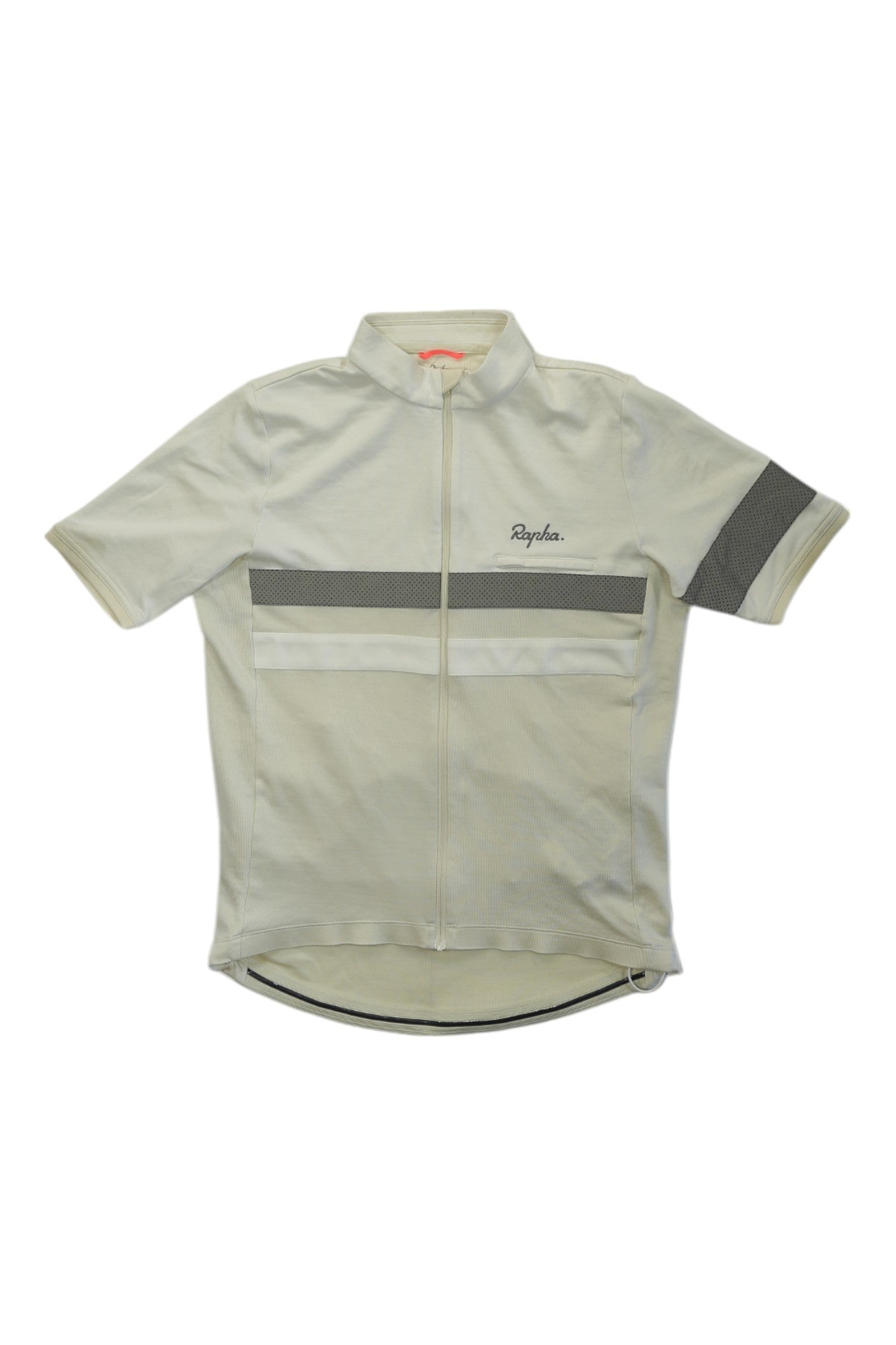 The Rapha Brevet Jersey II is a light gray, short-sleeve merino cycling jersey with reflective details, gray chest and sleeve stripes, a full front zipper, and the Rapha logo on the left chest—ideal for long rides.