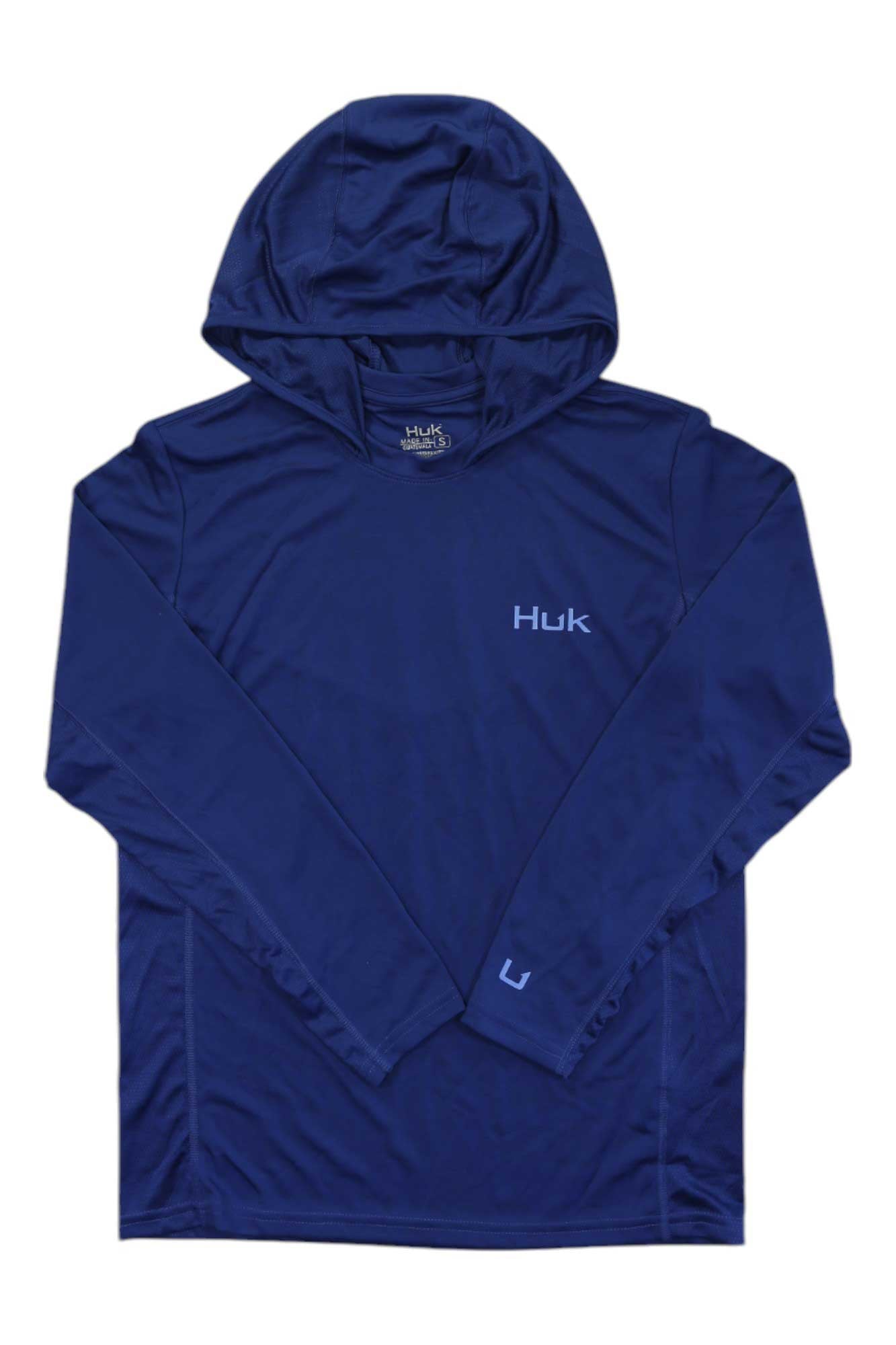 The Huk Mens Icon X Hoodie is a long-sleeve, dark blue men's fishing hoodie with a hood, Huk logo on chest and sleeve, moisture-wicking fabric, and cooling sun protection, shown laid flat on a white background.