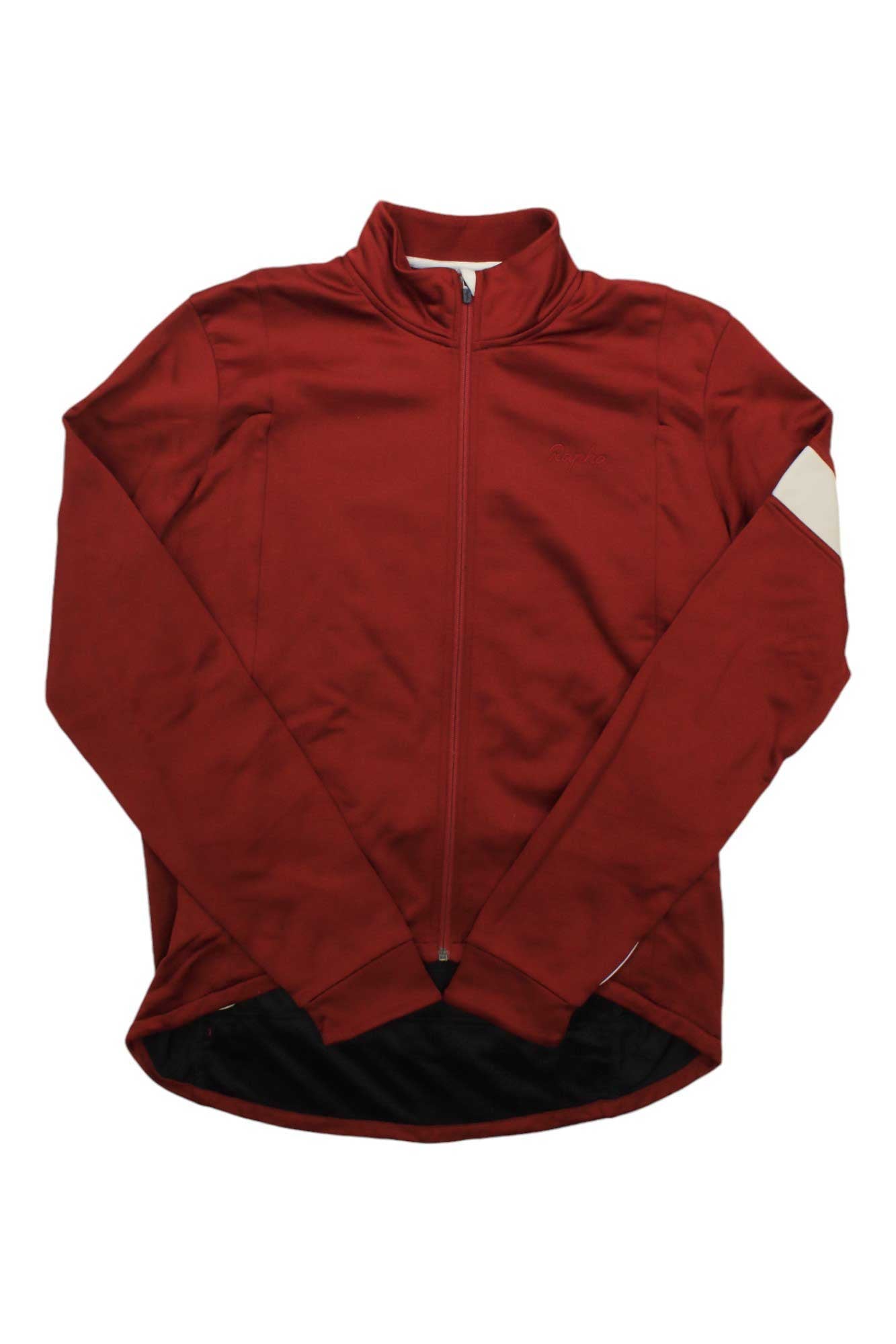 The Rapha Men's Classic Long Sleeve Jersey is a dark red, zip-up cycling jacket with long sleeves, a high collar, and a light stripe on the left arm. It features a slightly dropped back hem for added coverage.