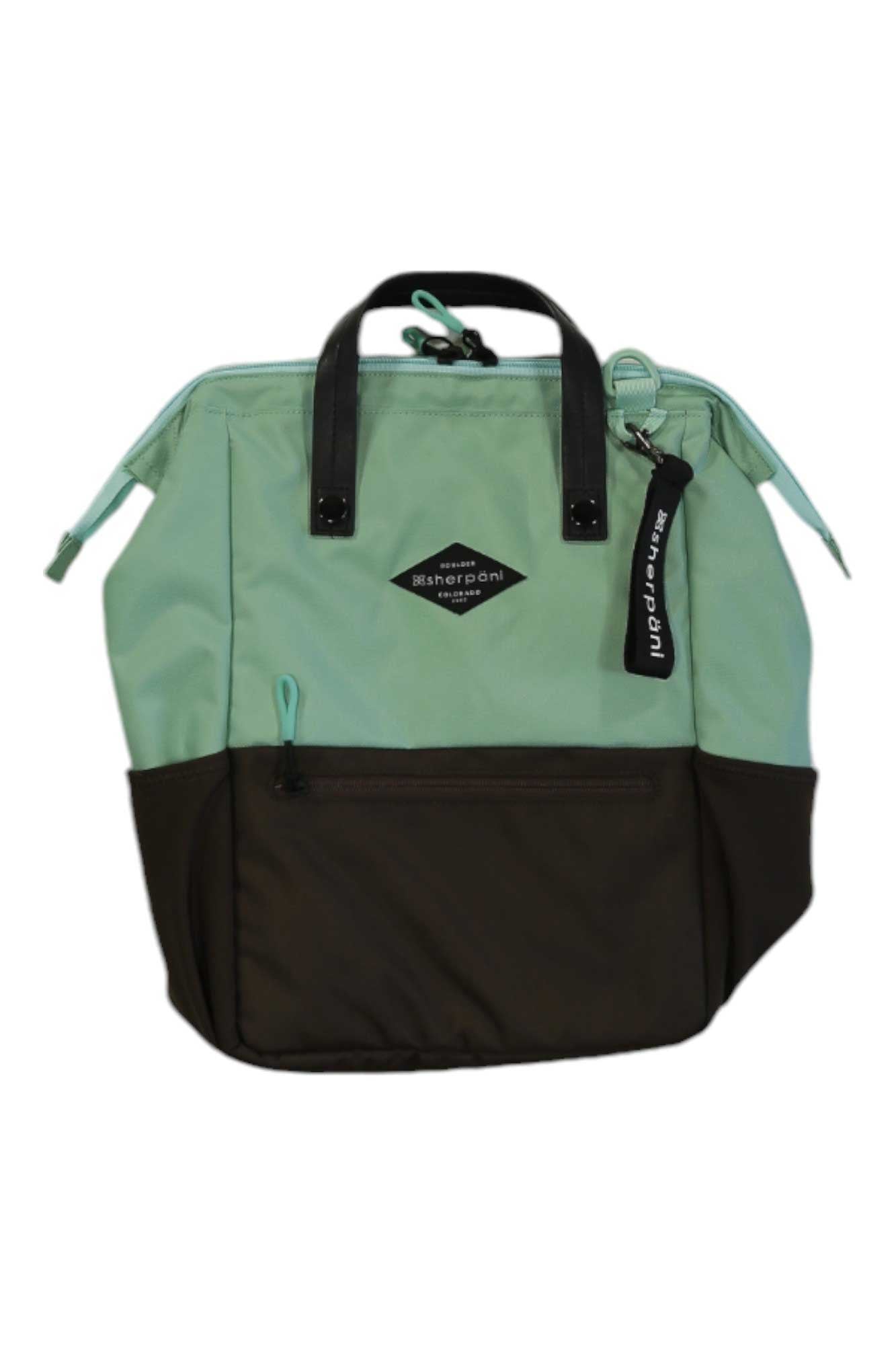 The Sherpani Womens Dispatch Bag in mint green and black features black handles, a front zip pocket, side pockets, and a black keychain tag—crafted from recycled materials for eco-friendly style.