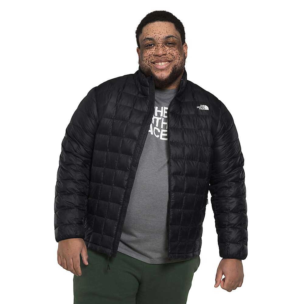 Men's black quilted puffer jacket, full-zip, stand collar, side pockets