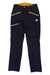 The Mammut Womens Eisfeld Advanced SO Pants are dark blue climbing pants for women, featuring three diagonal white-zippered pockets, an orange waistband lining, a white Mammut logo on the left thigh, and durable abrasion-proof soft shell fabric.