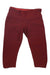 The Prana Womens Misty Knickers in maroon, with a wide waistband and cropped legs, offer moisture-wicking comfort—ideal activewear for hiking or workouts. Shown laid flat on a white background.