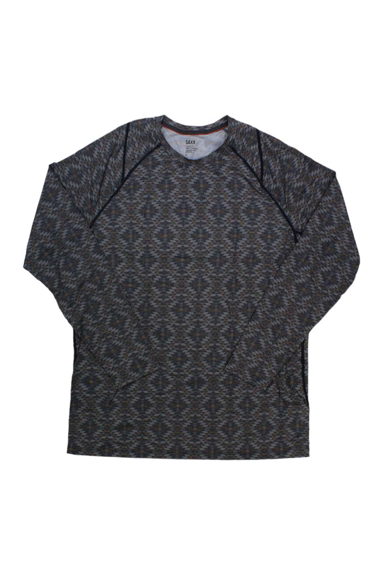 The SAXX Men's Quest Quick Dry Mesh Long Sleeve Crew features a geometric black and gray diamond pattern with moisture-wicking performance, ideal for hiking or active days. Shown laid flat on a white background.