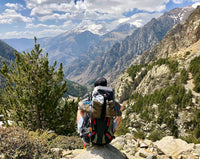 Hiker viewing mountain range