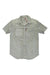 The Topo Designs Mens Short Sleeve Field Shirt is a light gray, short-sleeved shirt with a chest pocket and subtle red accent, shown slightly wrinkled and laid flat on a white background.