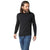 Man with long hair and a beard wears a black Smartwool Mens Sparwood Crew Sweater and blue jeans, standing and looking to his left against a plain white background.