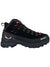 The Salewa Womens Alp Mate Winter Mid Waterproof Boot is a black hiking boot with red accents, rugged sole, red-and-black laces, and white Salewa logos on the side and heel. Sturdy winter mid boots made for outdoor adventures.