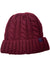 The Marmot Women's Millberry Hat is a maroon chunky knit hat with a thick ribbed fold-over cuff, cable knit pattern, and a small blue tag. It's made from recycled polyester for eco-friendly style.