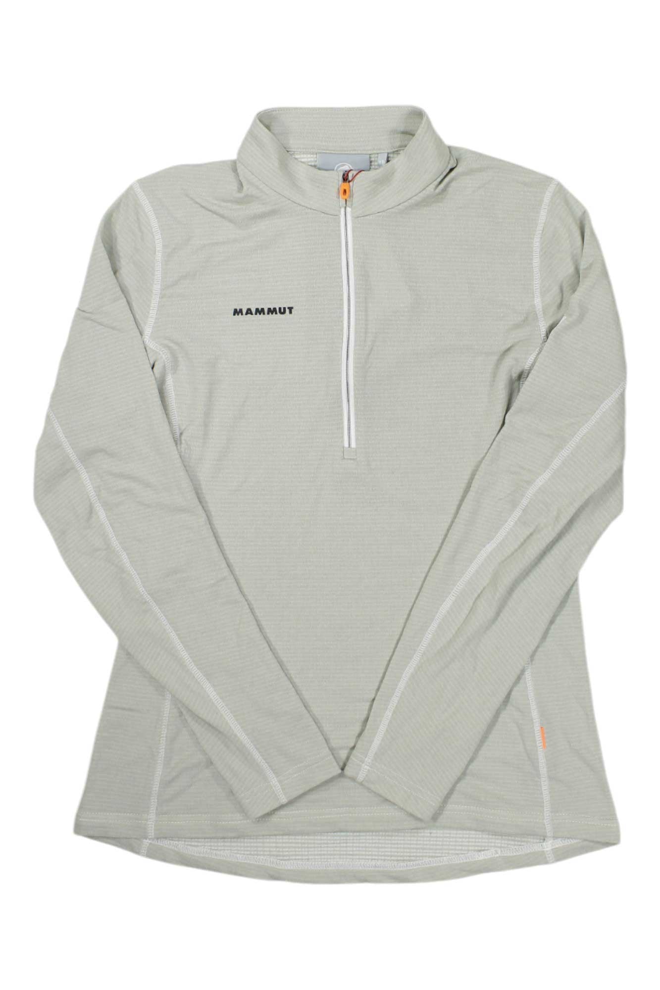 Light gray Mammut Womens Aenergy Light ML Half Zip Pullover featuring Polartec Power Grid fabric, long sleeves, a quarter-zip front, stand-up collar, white stitching, and the Mammut logo on the left chest. Laid flat on a white background.