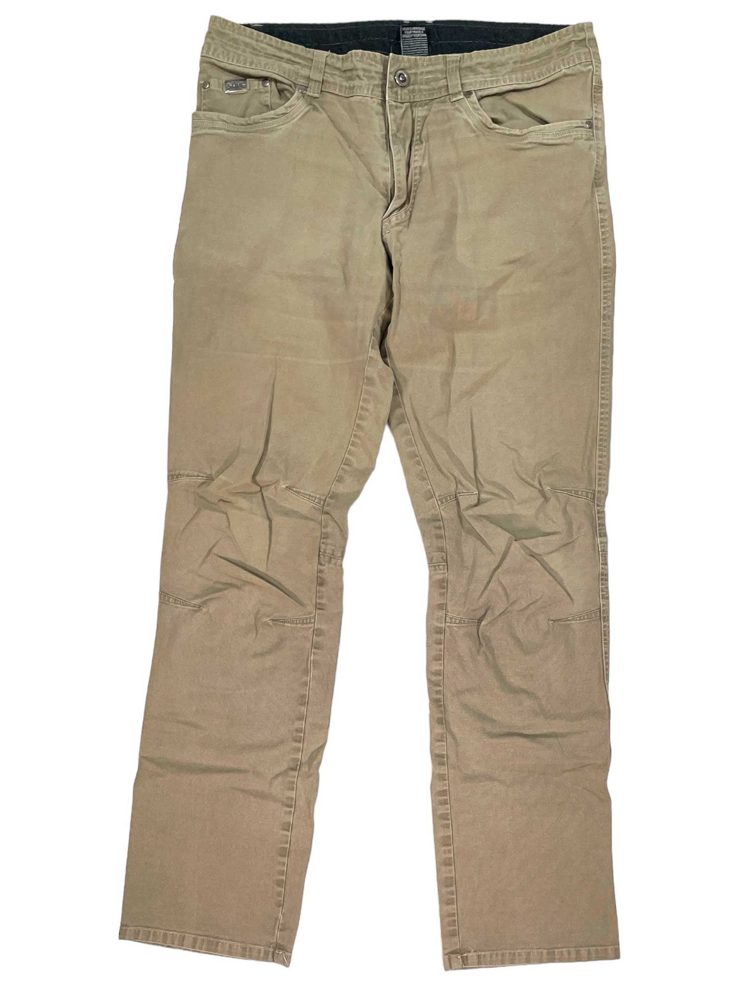 A pair of Kanvus Jeans in light brown khaki laid flat, made from lightweight durable canvas with an articulated design for freedom of movement, featuring a button and zipper closure, two front pockets, and visible creases.