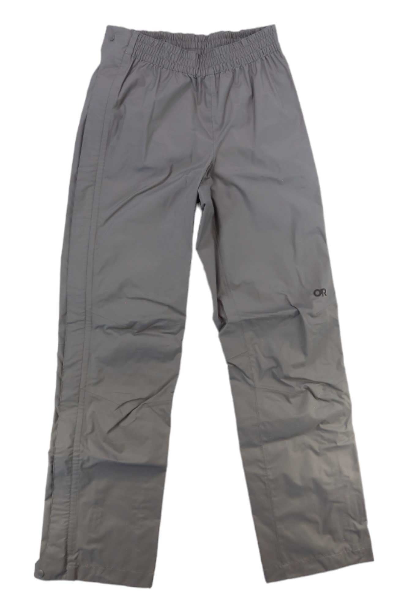 The Outdoor Research Womens Apollo Pant is a light gray waterproof hiking pant for women, featuring an elastic waistband, straight legs, and a subtle OR logo on the upper left thigh.