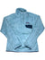 Women's Re-Tool Snap-T Pullover: Light blue Polartec Thermal Pro fleece with high collar, dark blue-accented chest pocket, and small rectangular Patagonia logo above the pocket. This textured layer is Fair Trade Certified.