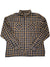 The Kuhl Mens Dillingr Flannel Shirt is a long-sleeved, button-up flannel with yellow and black plaid, front chest pockets, and buttoned cuffs—ideal as an outdoor shirt.