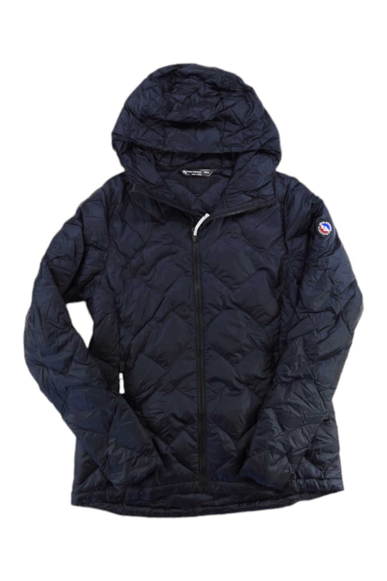 The Big Agnes Womens Bearsley Jacket, shown in dark navy blue with a hood, is ultralight, water-repellent, and ideal for chilly days. Displayed against a white background.