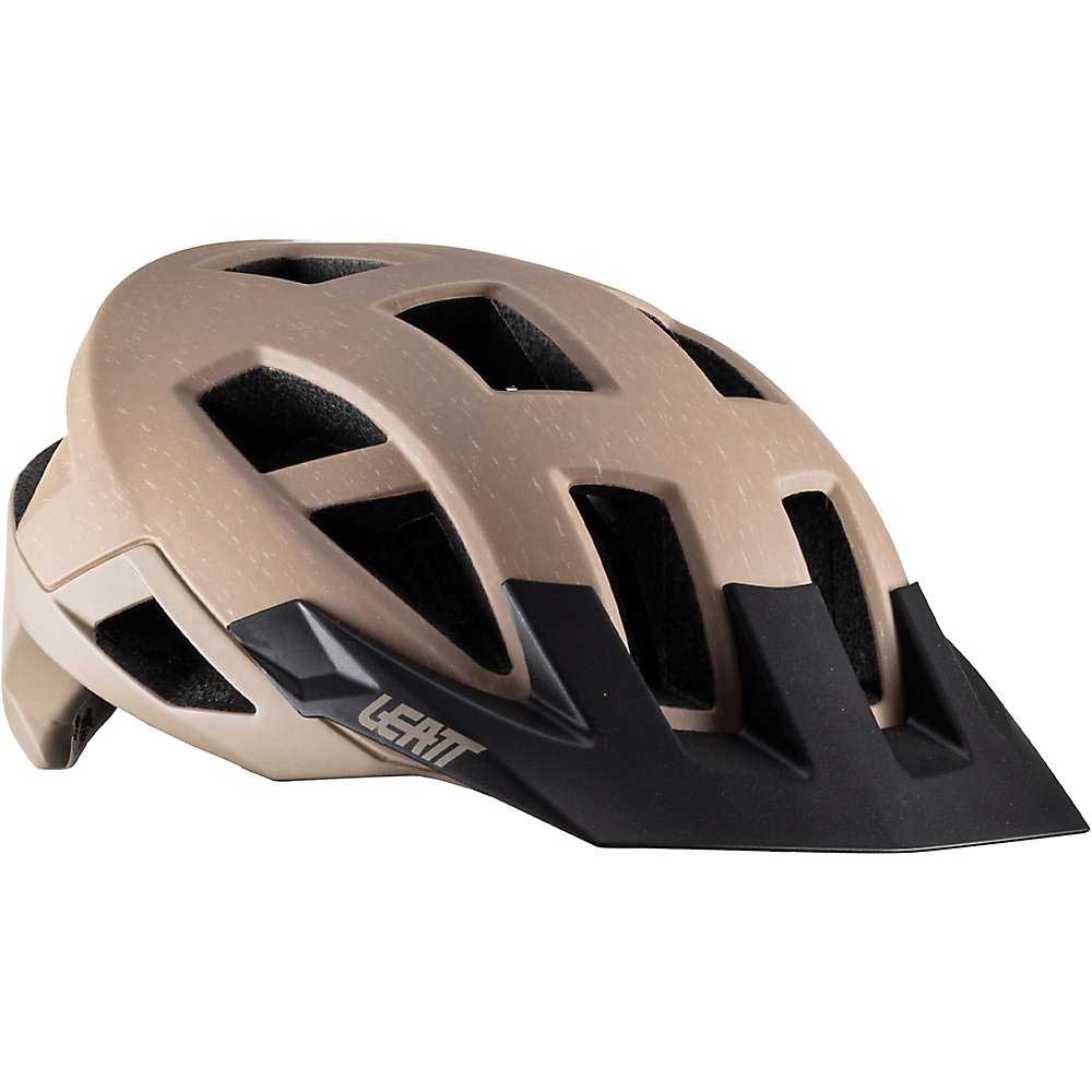 The Leatt MTB Trail 2.0 Helmet is a beige and black mountain bike helmet featuring multiple ventilation holes, a black angular visor, and "Leatt" printed on the side for added style.