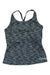 The Rab Womens Lineal Tank features a racerback design and blue and black stripes, made from moisture-wicking fabric with a Rab logo tag at the hem—perfect for travel or active days.