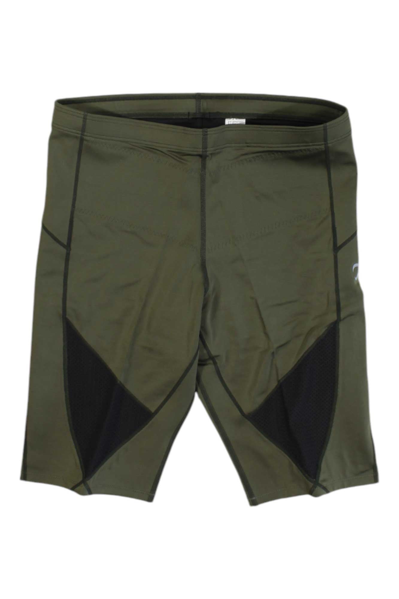 The CW-X Mens Stabilyx Ventilator Joint Support Compression Shorts in olive green with black mesh side panels feature moisture-wicking fabric for dry comfort, shown laid flat on a white background.