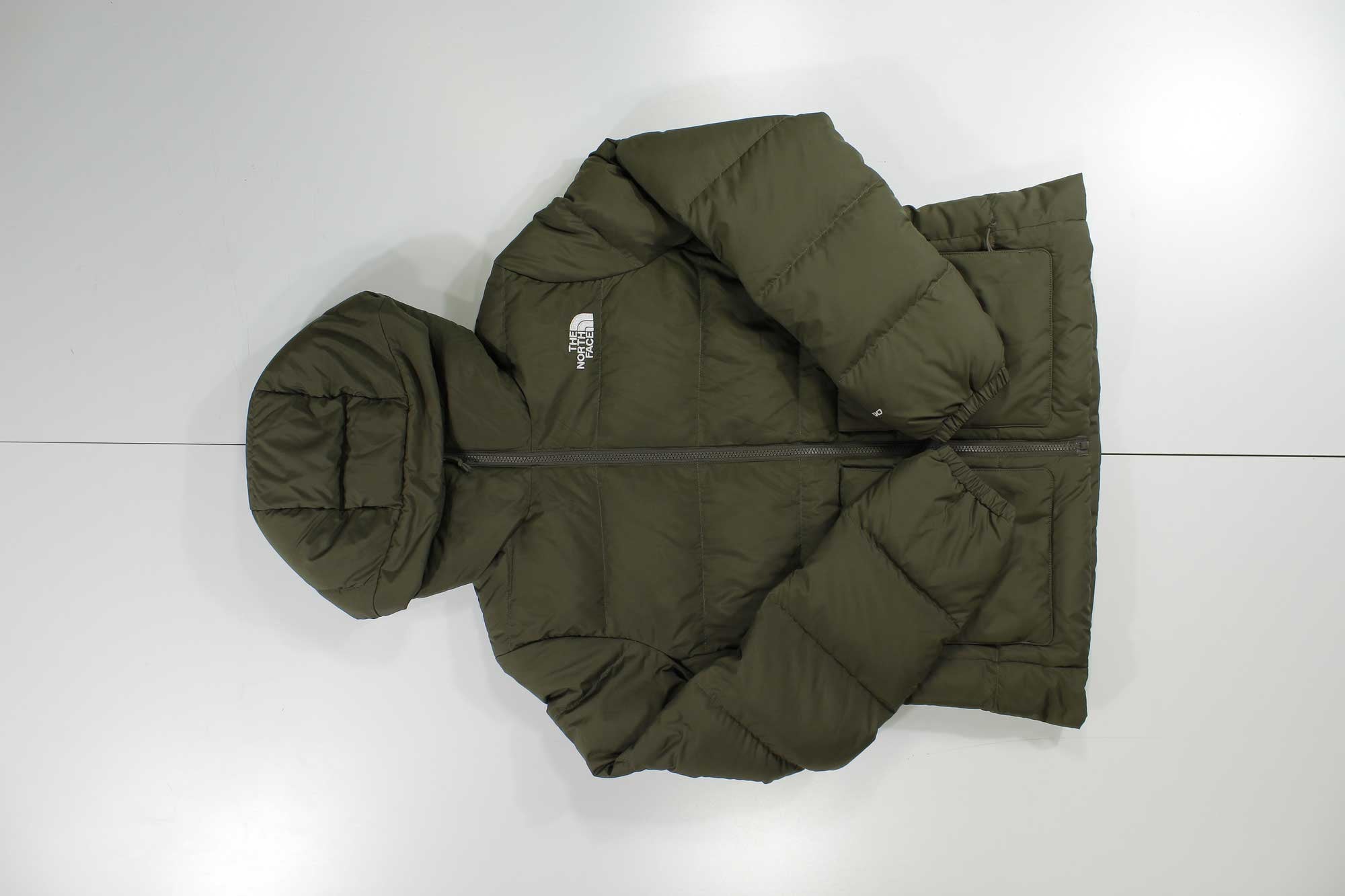 Olive green hooded puffer jacket with front zipper and logo patch