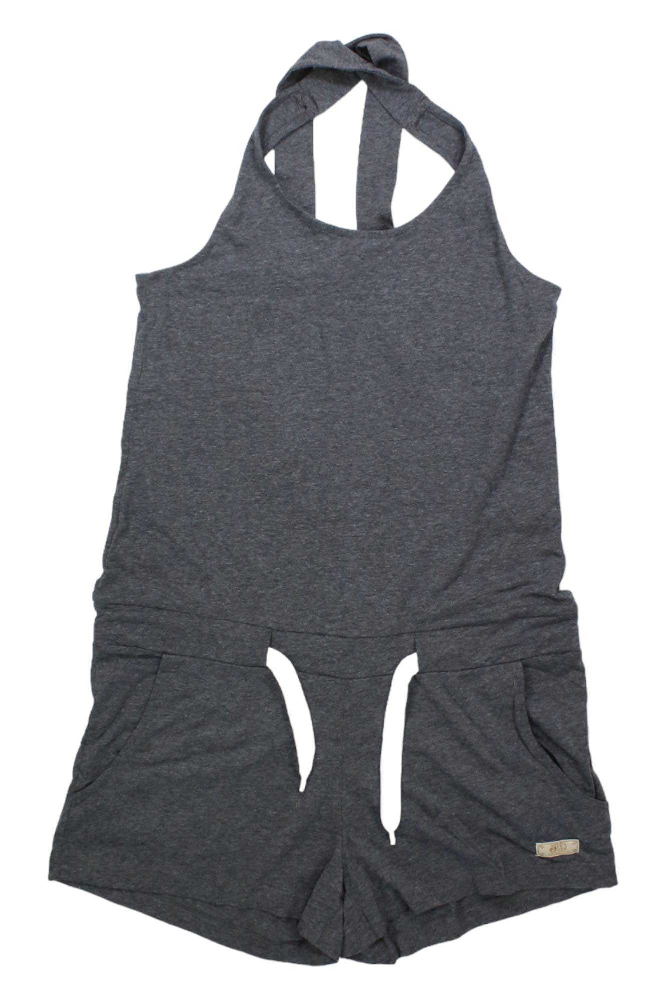 The Picture Women's Abby Overall is a sleeveless, dark gray romper with halter neck straps, two front pockets, and a small left-leg fabric label. Made from soft organic cotton, it’s perfect for casual wear or light fitness activities.