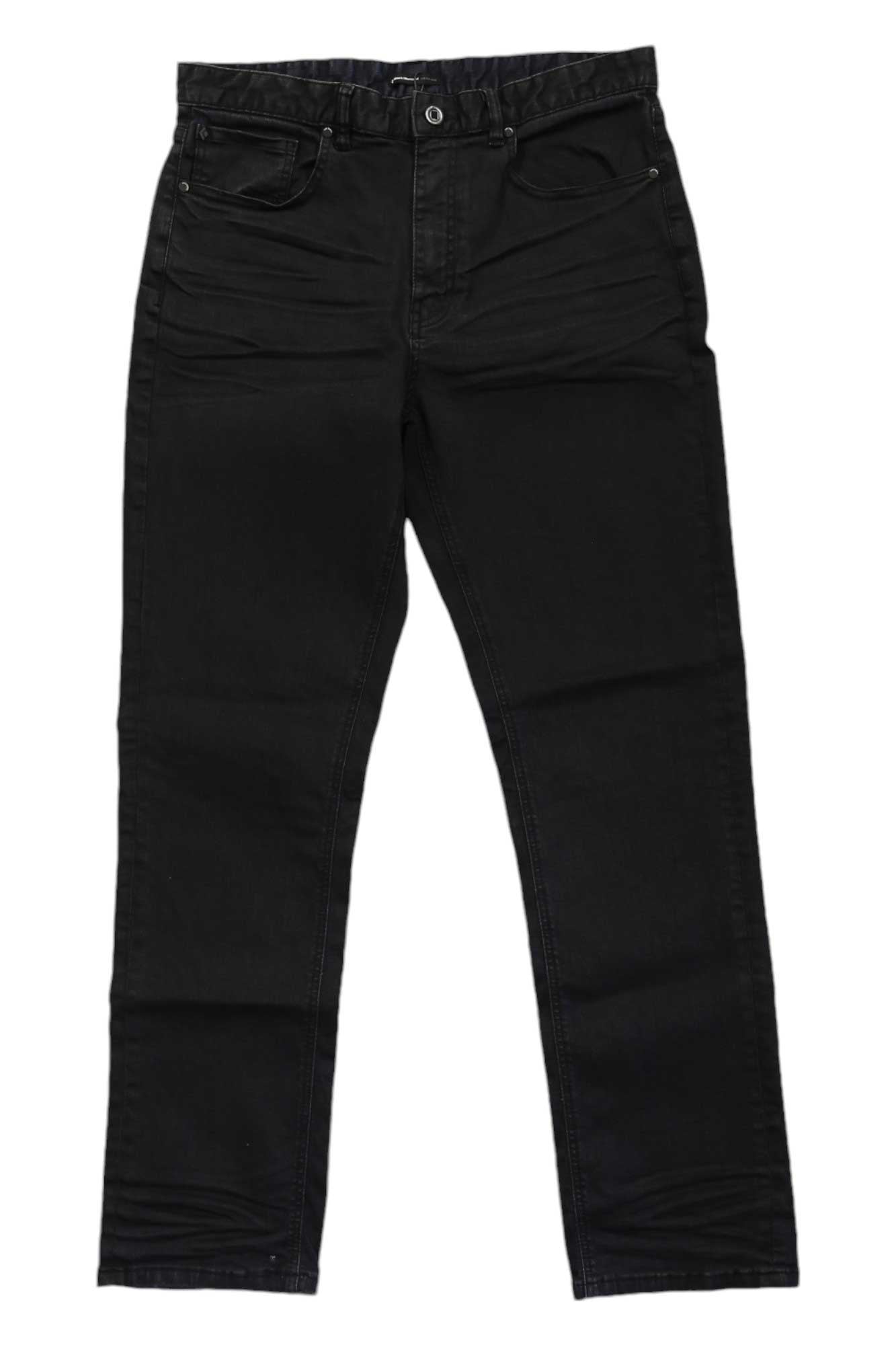 The Black Diamond Men's Forged Denim Pant is a slim fit black jean with front and back pockets, button and zipper closure, made from durable Cordura Denim, shown flat on a white background.