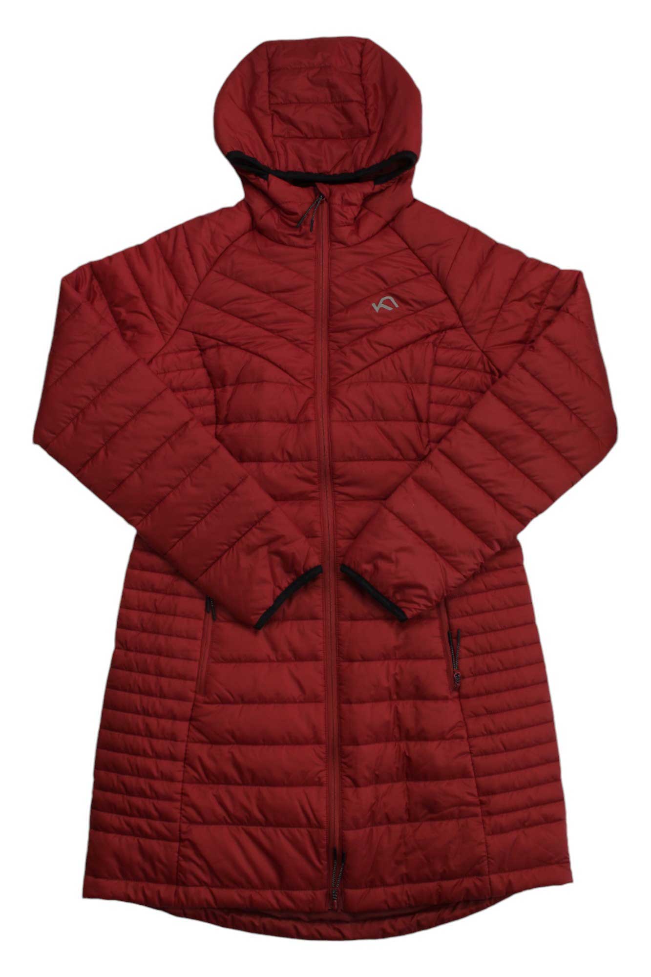 The Kari Traa Womens Aada Primaloft Coat is a long, hooded red quilted coat with front zipper and two side pockets, shown laid flat on a white background.