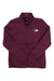 A maroon The North Face Women's Canyonlands Full Zip Jacket with long sleeves, slim fit, and white logo on the left chest is laid flat on a white background. This women's stretch fleece jacket offers comfort and style.