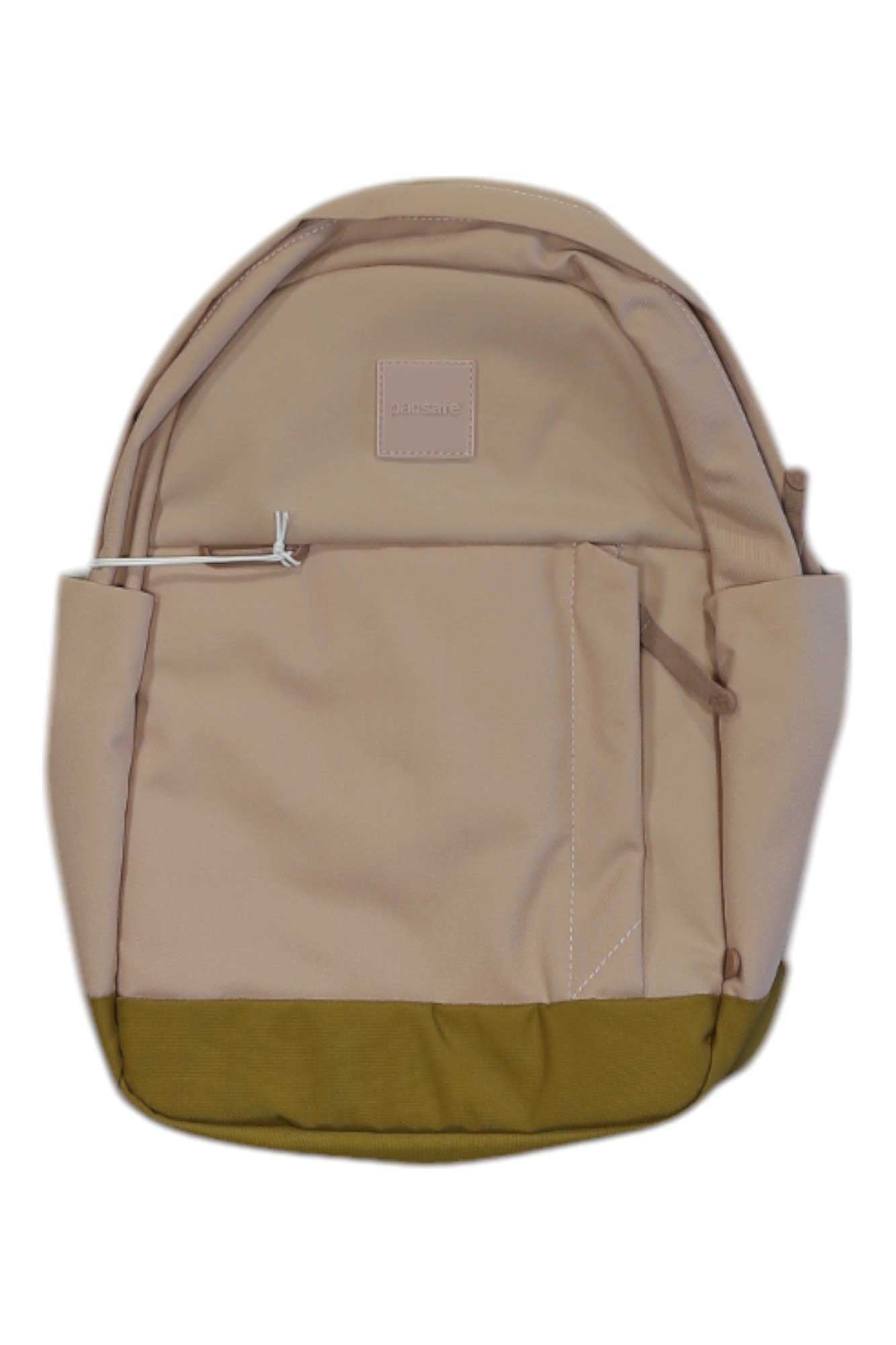 PacSafe Go 15L backpack in sunset pink with front pocket and top carry handle