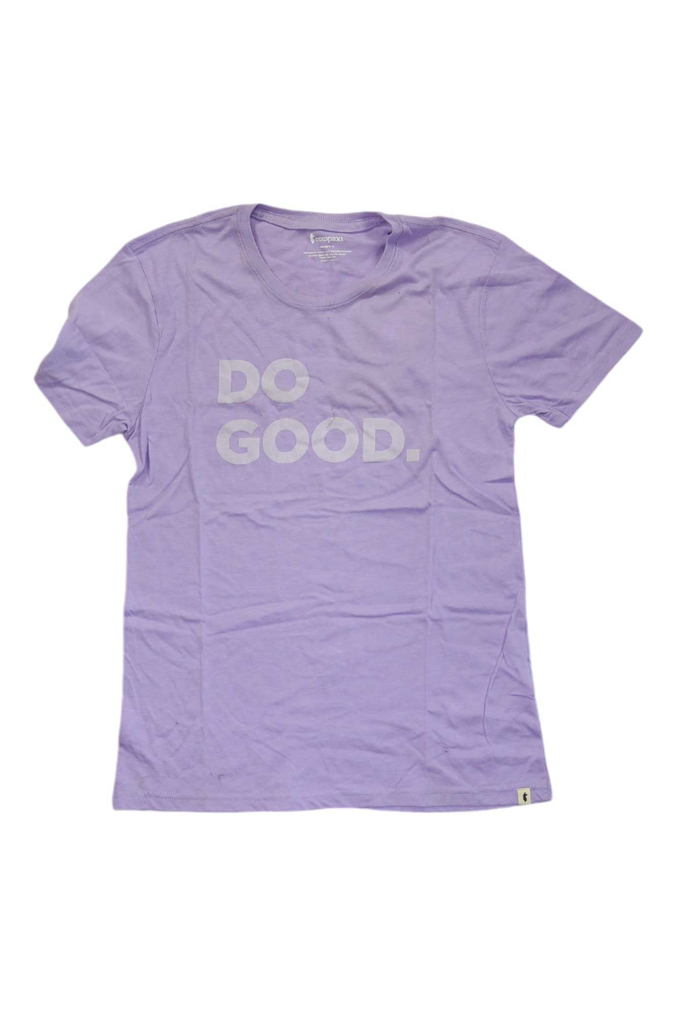 The Cotopaxi Womens Do Good SS Tee is a light purple, organic cotton shirt with short sleeves and "DO GOOD." in bold, light-colored letters on the chest, shown laid flat on a white background.