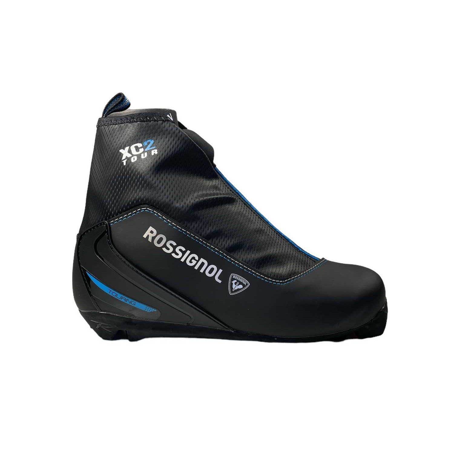 A black Rossignol Women's XC2 FW Ski Boot with blue accents, Polartec lining, and branding is displayed in side view on a white background.