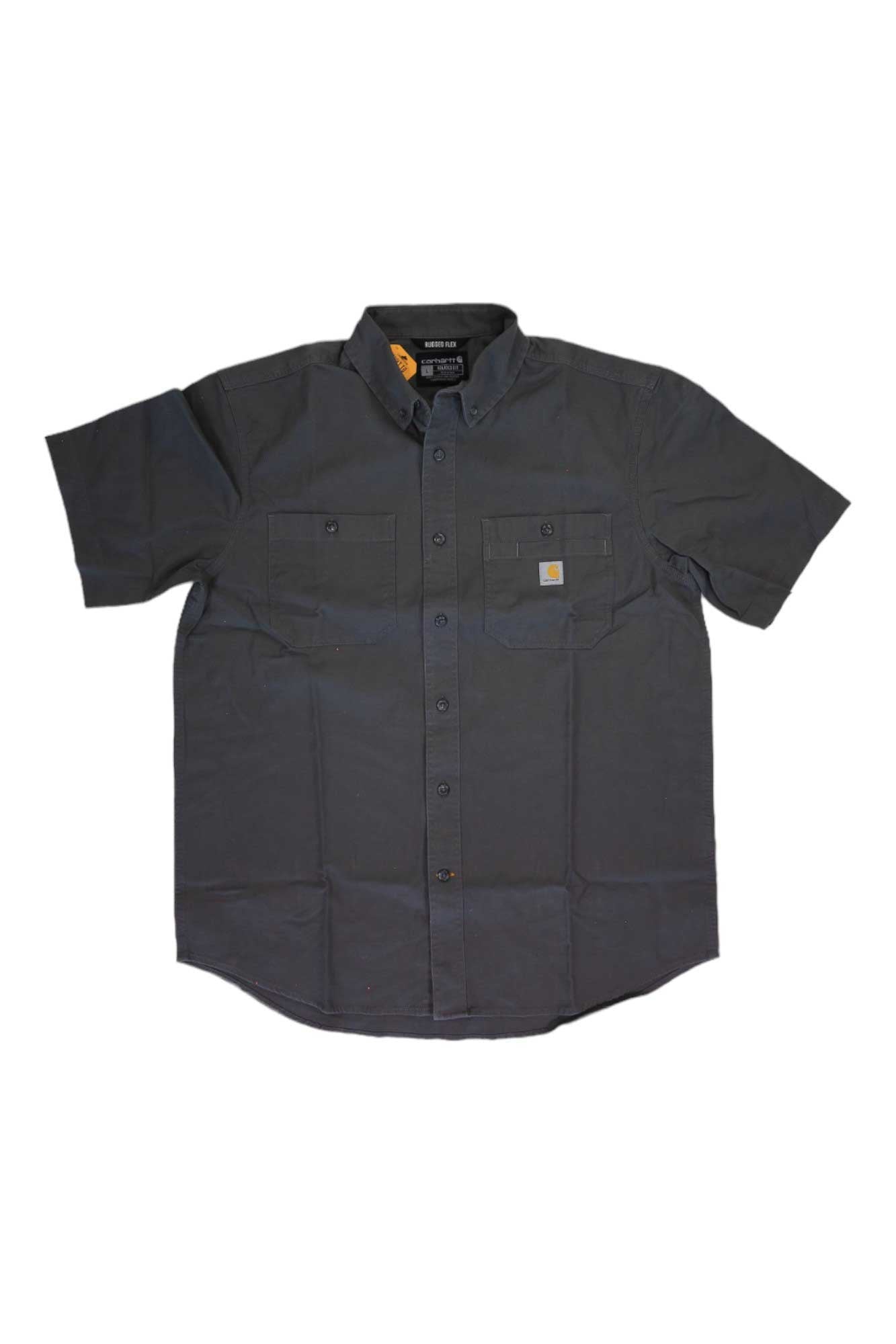The Carhartt Mens Rugged Flex Rigby SS Work Shirt in dark gray features short sleeves, two chest pockets, rugged flex technology, and a logo patch on the left pocket, shown laid flat on a white background.