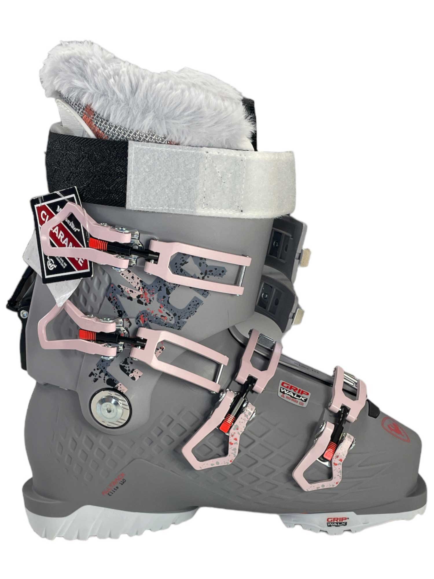 Rossignol ski boot in lilac gray with pink straps and buckles, gray sole