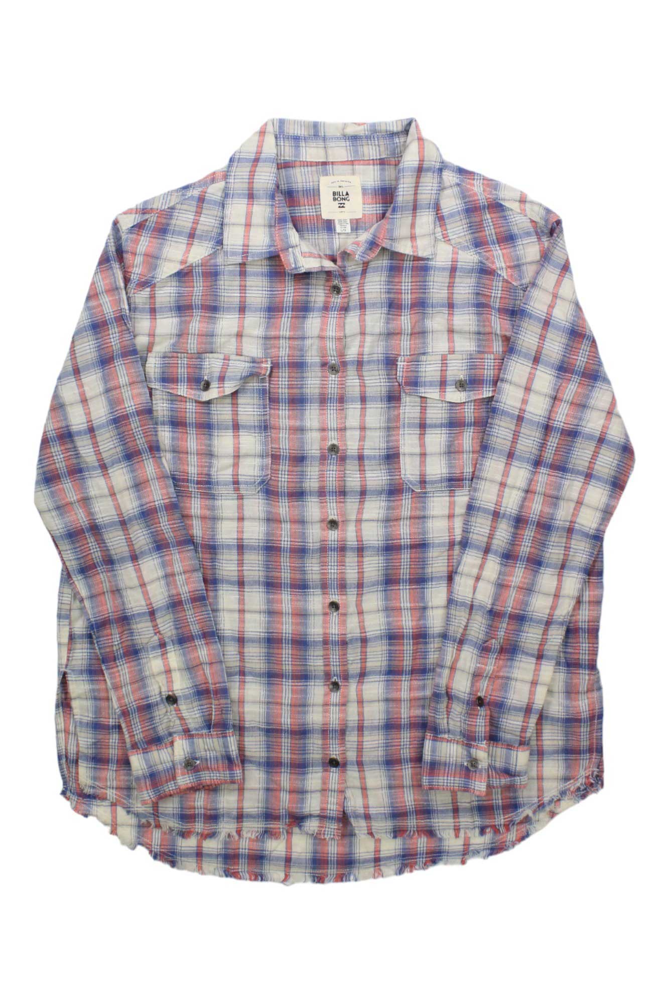 The Billabong Womens Riding Solo Shirt is a long sleeve cotton shirt in red, blue, and white plaid with two chest pockets and buttoned flaps, shown laid flat on a white background.