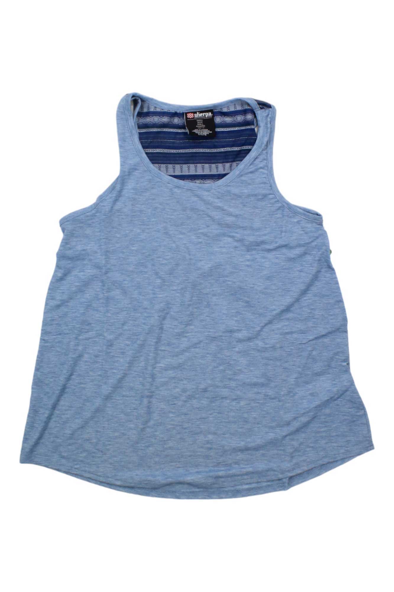 Light blue Sherpa Womens Asha Tank laid flat on a white background, showcasing a rounded neckline and curved hem. Made from moisture-wicking drirelease fabric with the inside neck label visible.