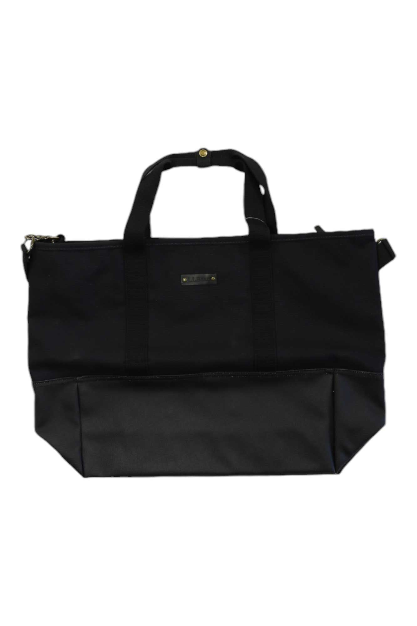 The L.L.Bean NorEaster Tote Bag is a large black tote made from heavy-duty canvas with short handles, a detachable shoulder strap, a rectangular base, metal logo plate on the front, and snap closure.