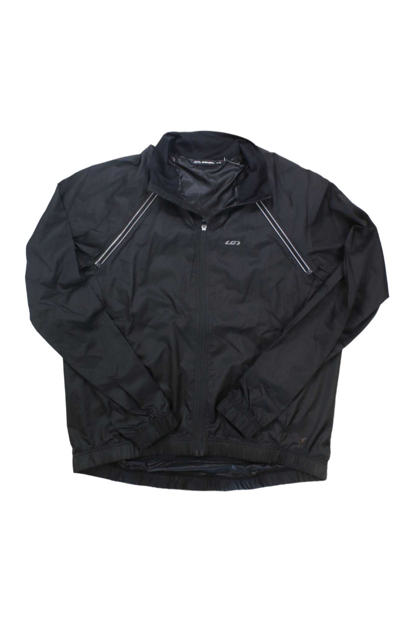 The Louis Garneau Men's Modesto Switch Jacket is a black, lightweight, windproof cycling jacket with a front zipper, elastic cuffs, small reflective shoulder stripes, water resistance, stand-up collar, and a subtle chest logo.