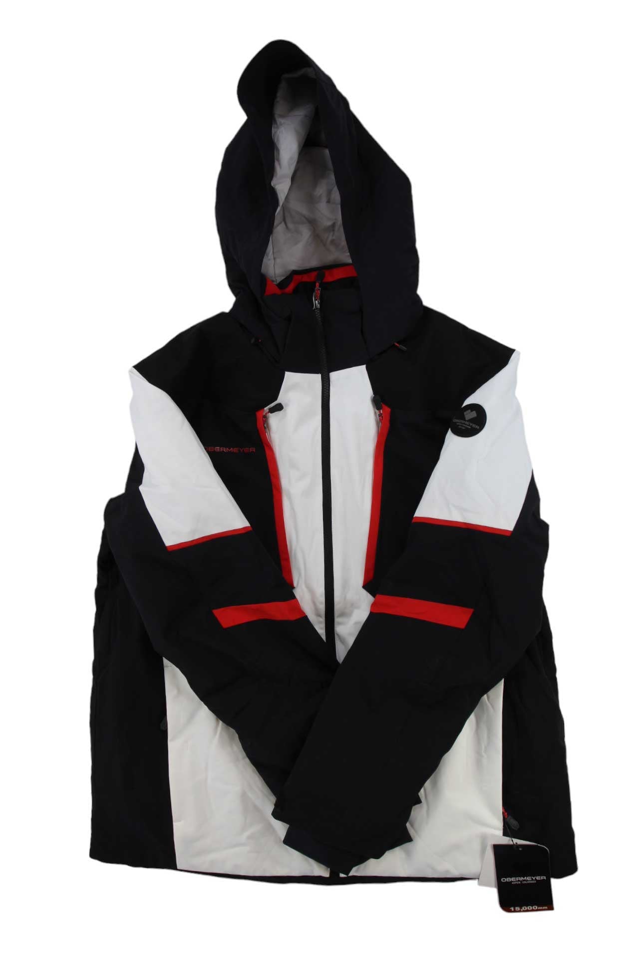 The Obermeyer Men's Foundation Jacket, shown in black, white, and red with front zippers and a tag attached, is made from recycled material and displayed against a white background.