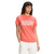 Women's short-sleeve crewneck T-shirt in coral pink with NeverStop Exploring logo print