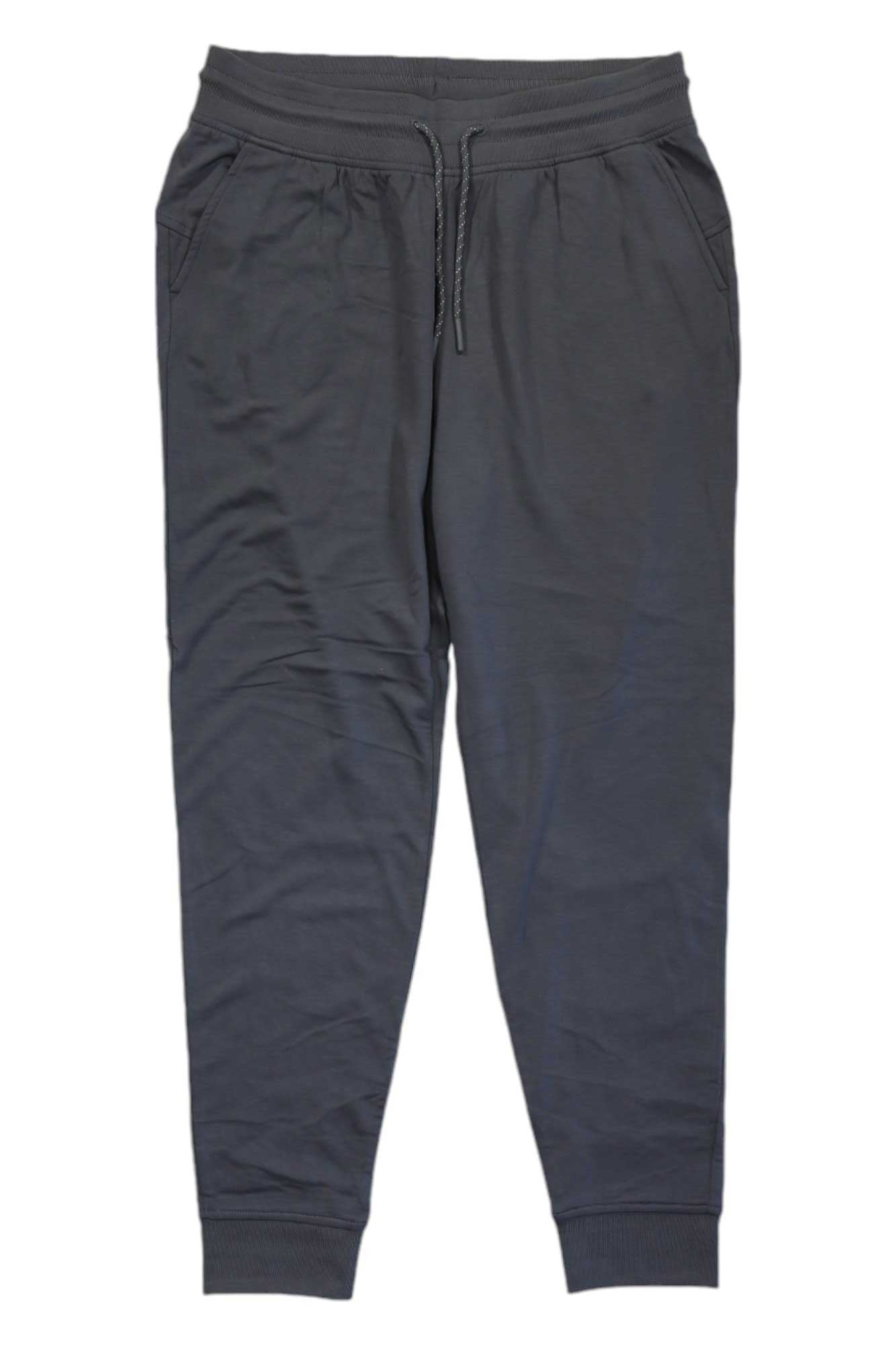 The Free Fly Womens Bamboo Lightweight Fleece Jogger, in dark gray, features an elastic waistband with drawstring, side pockets, and ribbed cuffs. Made from soft bamboo fleece fabric, the joggers are shown laid flat on a white background.