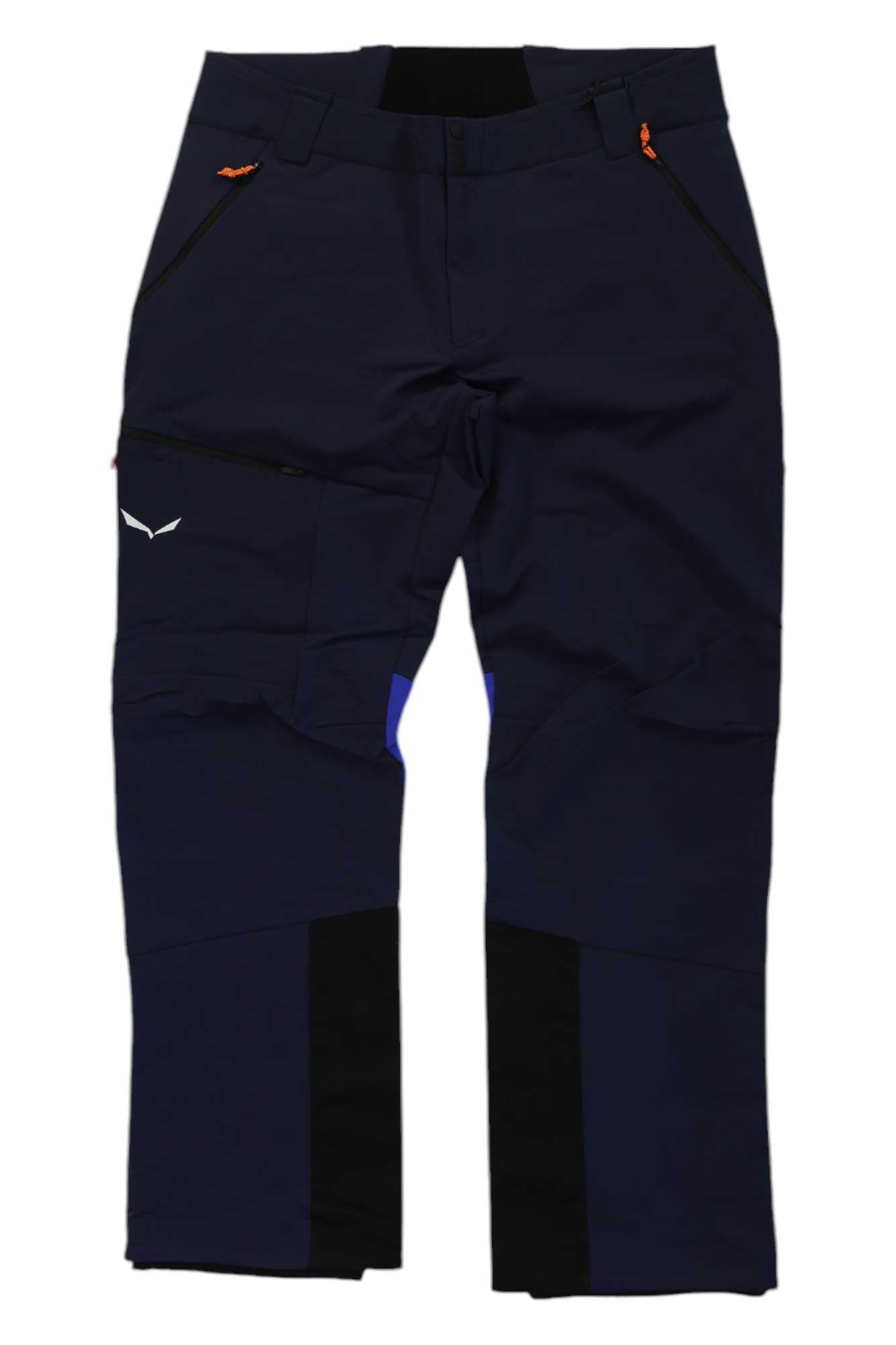 The Salewa Mens Sella DST Pant is a pair of dark navy blue water-repellent ski touring pants with black knee patches, zippered pockets, and orange zipper pulls, made from DURASTRETCH softshell fabric, shown laid flat on a white background.