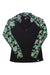 The Wild Rye Women's Hailey Half Zip Top is a black merino wool pullover with long sleeves, a front zipper, and floral-patterned sleeves and collar in green, blue, and white.