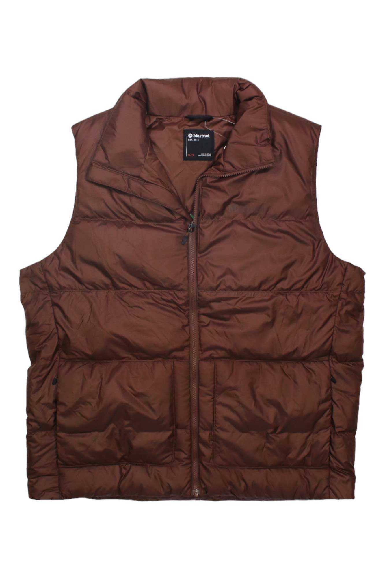 A brown Marmot Mens Guides Down Vest with a front zipper, high collar, and sleeveless design is laid flat on a white background. It features 700-fill down insulation, horizontal stitching, and a black label on the inside collar.